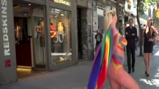 Painted body busty blonde disgraced in public